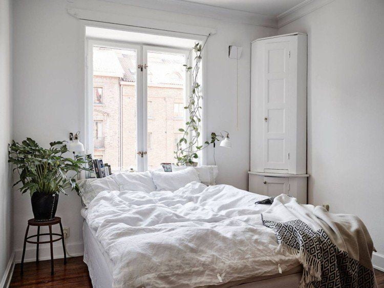 a white small double bedroom
