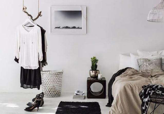 A suspended and graphic closet in the room