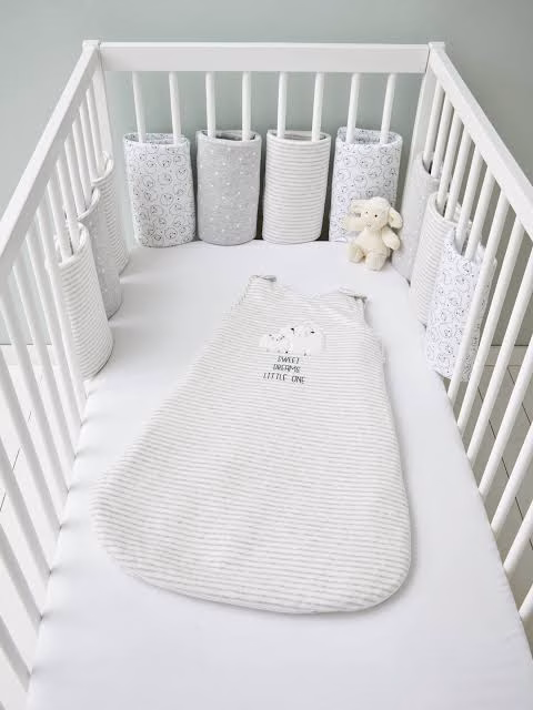 Use soft materials in his bed in cocooning baby room