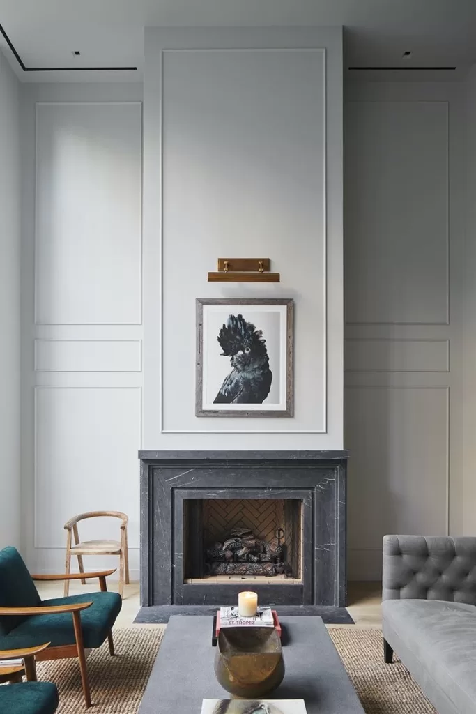 A wall with relief in fireplace decoration