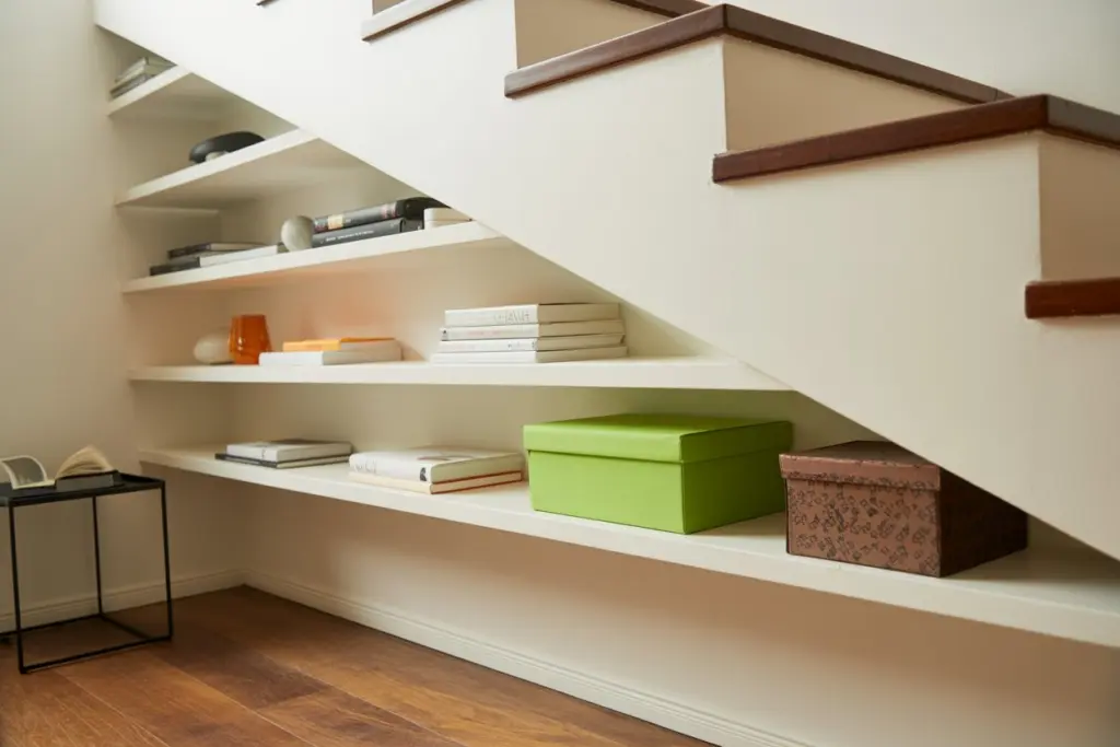 Under stairs space shelves that are out the ordinary