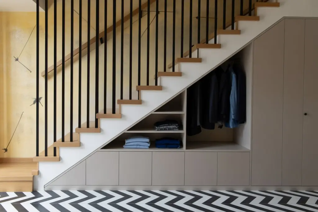 a closet Under stairs space to store clothes and shoes