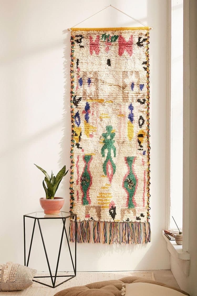 a carpet to decorate an empty wall