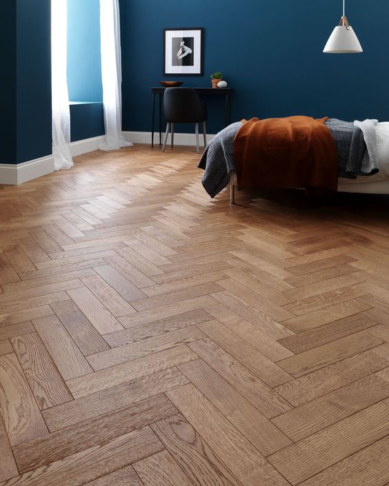 Herringbone wood flooring bedroom
