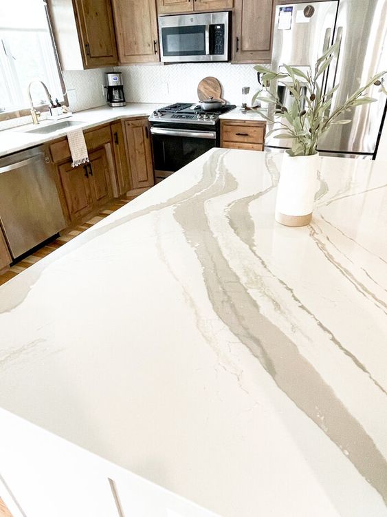 Kitchen countertop: how to think it perfectly? 10 A kitchen enhanced by quartz, which combines the properties of stone and resin