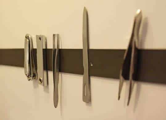 Magnetic strips for bathroom storage solutions