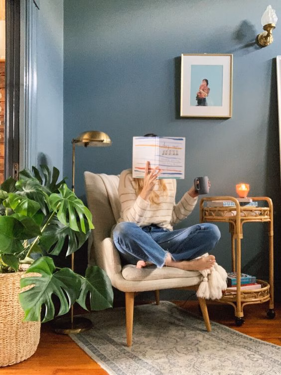 artwork, photographs, or plants to make your reading nook 