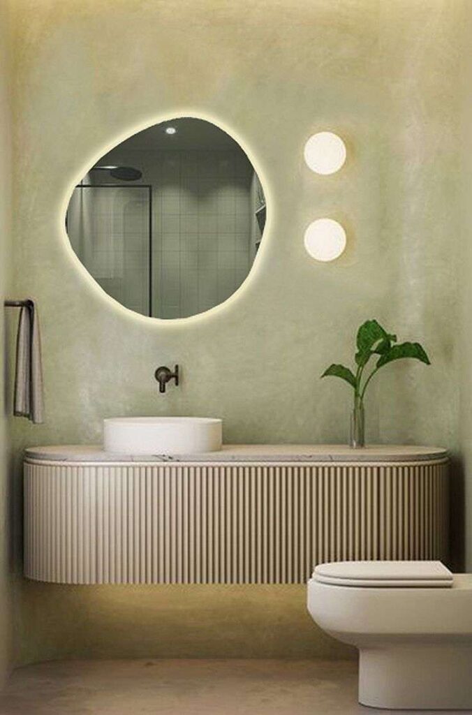 round bathroom mirror with irregular edges without frame 