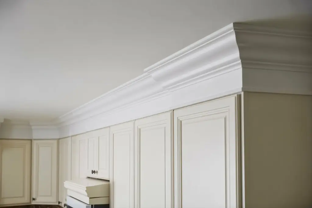 Kitchen Cabinets: How to Functionaly Decorate Above Your Cabinets 7 Decorating Above your Kitchen Cabinets by Adding white crown molding