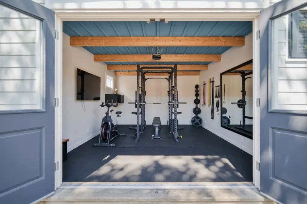 How to design a gym room at home 19 Install a gym in a garage