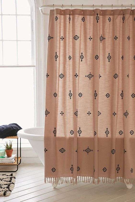 Why invest in a shower curtain among essential bathroom accessories?