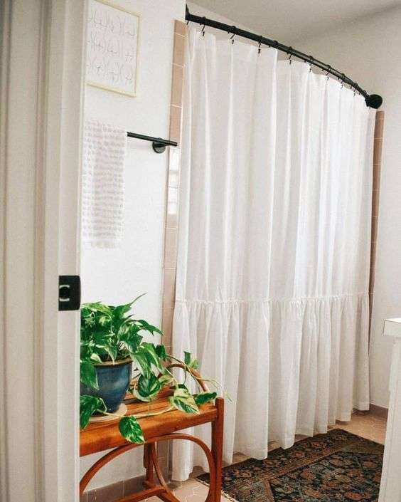 Shower curtain bar