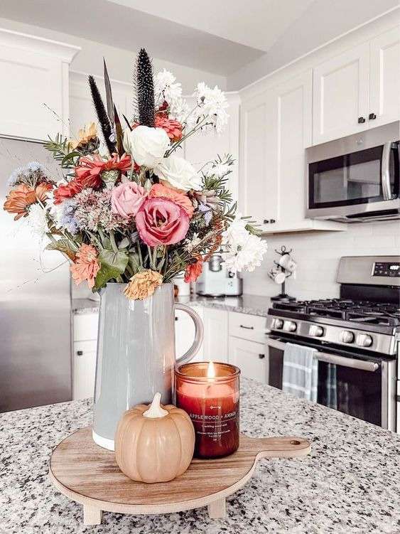 Add scents with candles and flowers: 