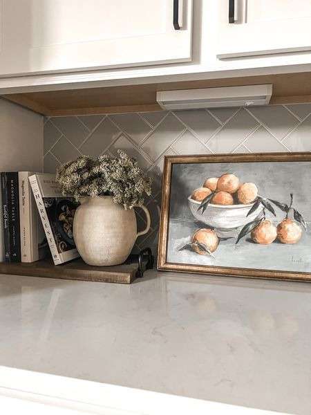 Add a personal touch with photographs for your Kitchen Countertop Decoration: