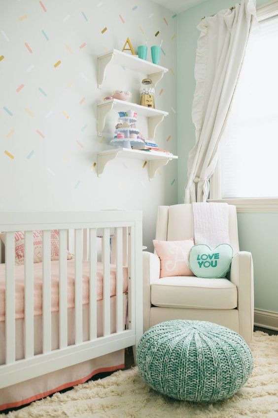 Soft pastel-colored girl nursery room