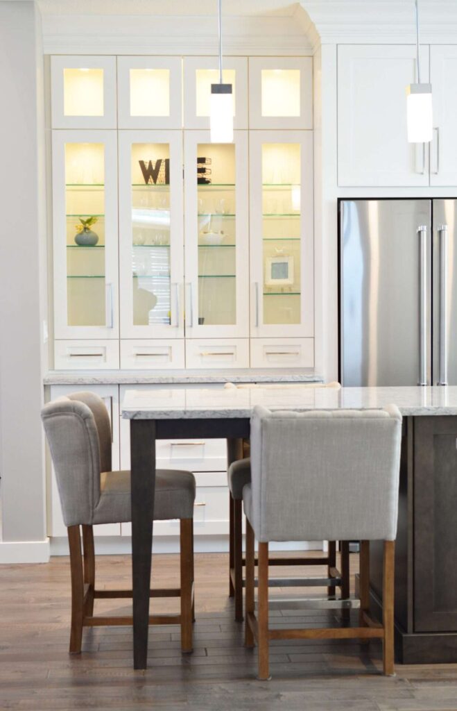 Decorating Above your Kitchen Cabinets by Adding white crown molding