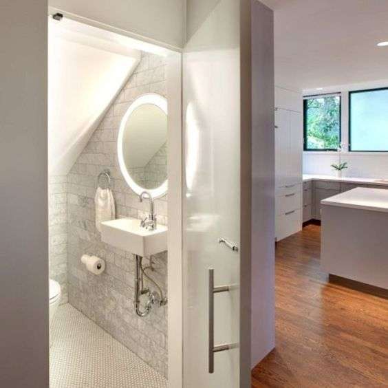 Lighting in toilet under the stairs
