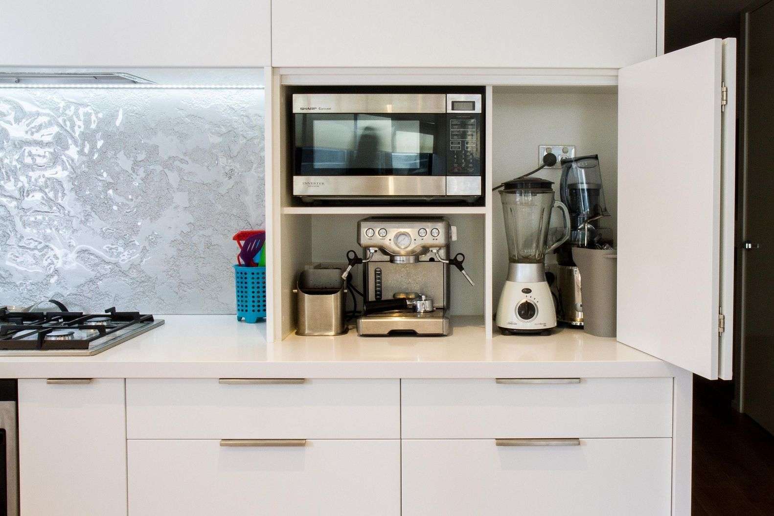 Store appliances in cupboards
