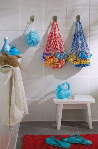  kids' bathroom with colorful baskets