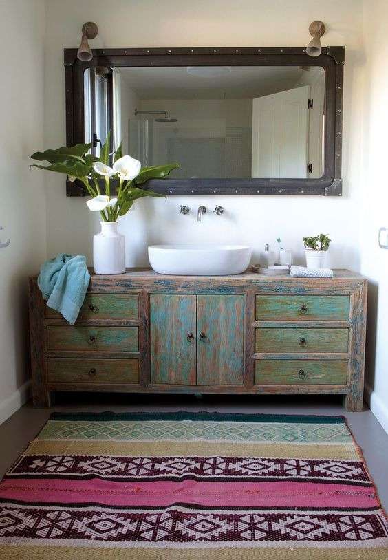 painting the bathroom cabinets for vintage and rustic  feel.