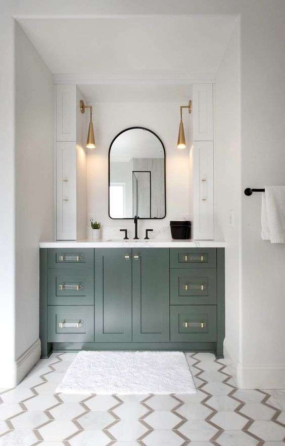 using earthy green for painting the bathroom cabinets