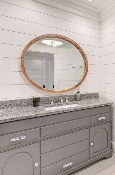 shiplap behind bathroom mirror