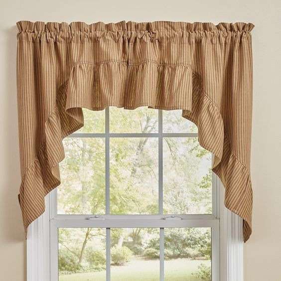 Country bathroom with window coverings cottage style.