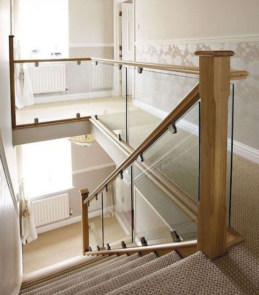 wooden railing with streamlined glass 