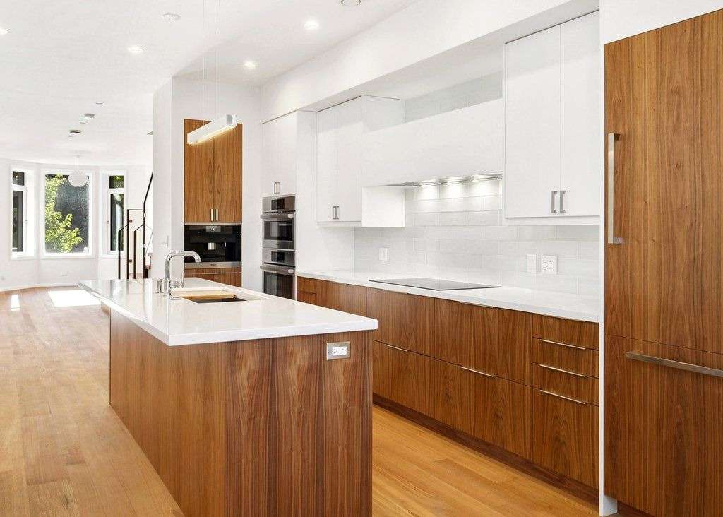 Classic White wall paint and Wood kitchen cabinets