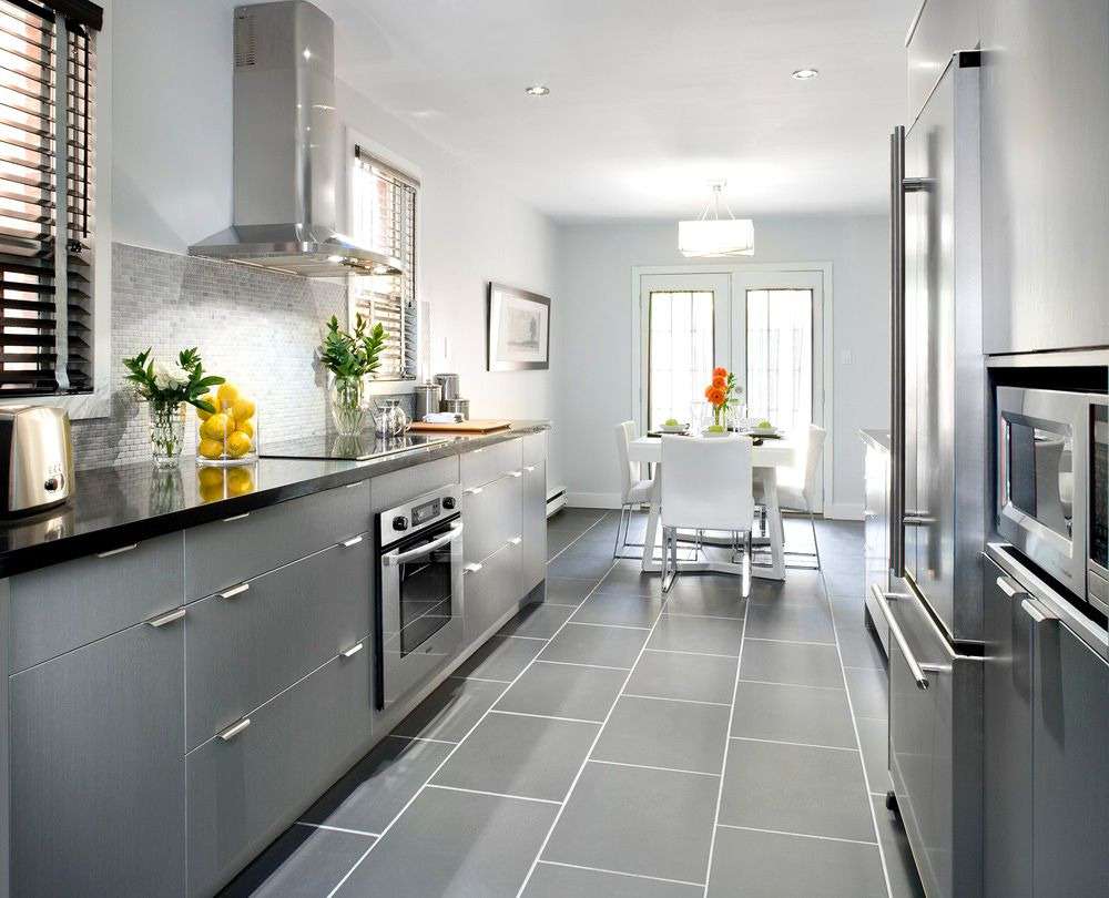 light gray wall paint with a slightly darker gray kitchen cabinets 