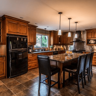 colonial kitchen with black appliances