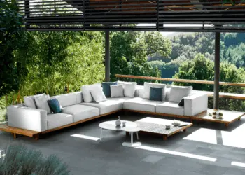 Modern outdoor lounge with greenery