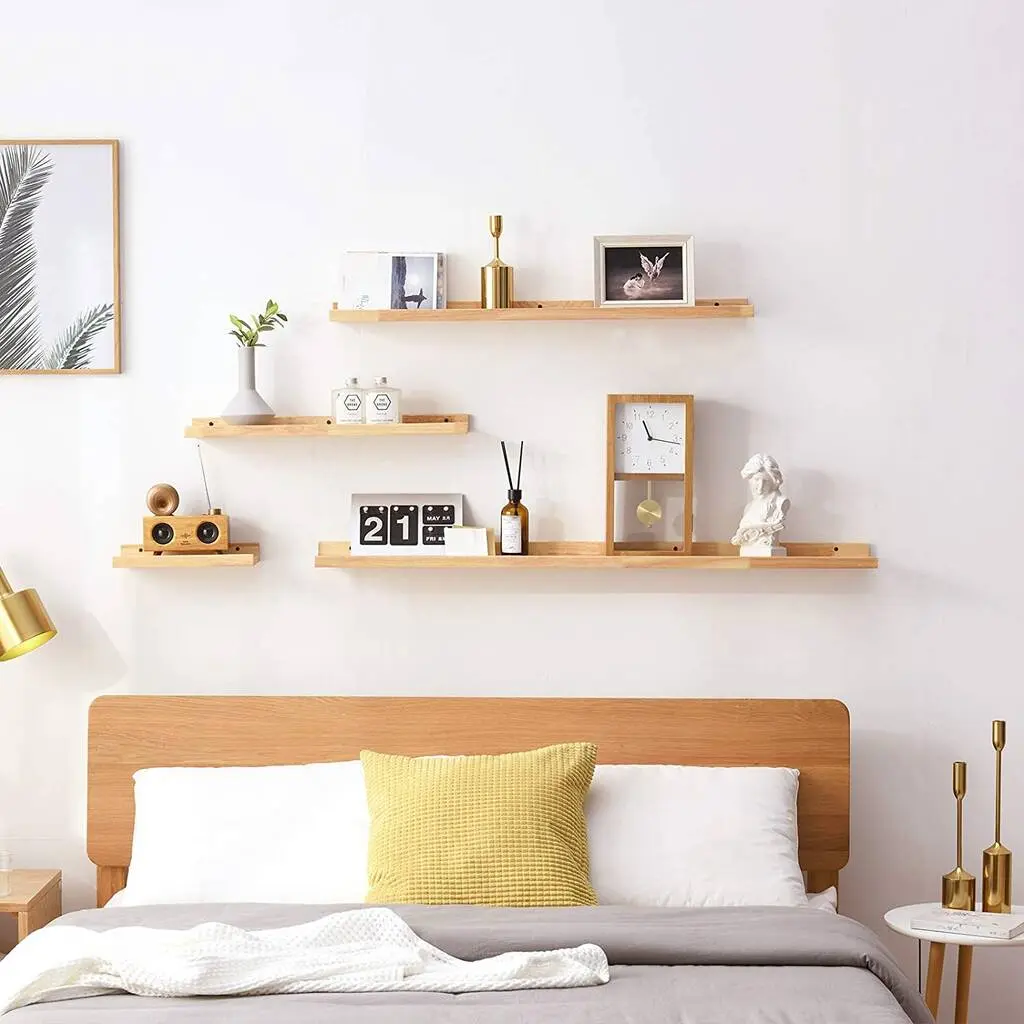 floating shelves by bed