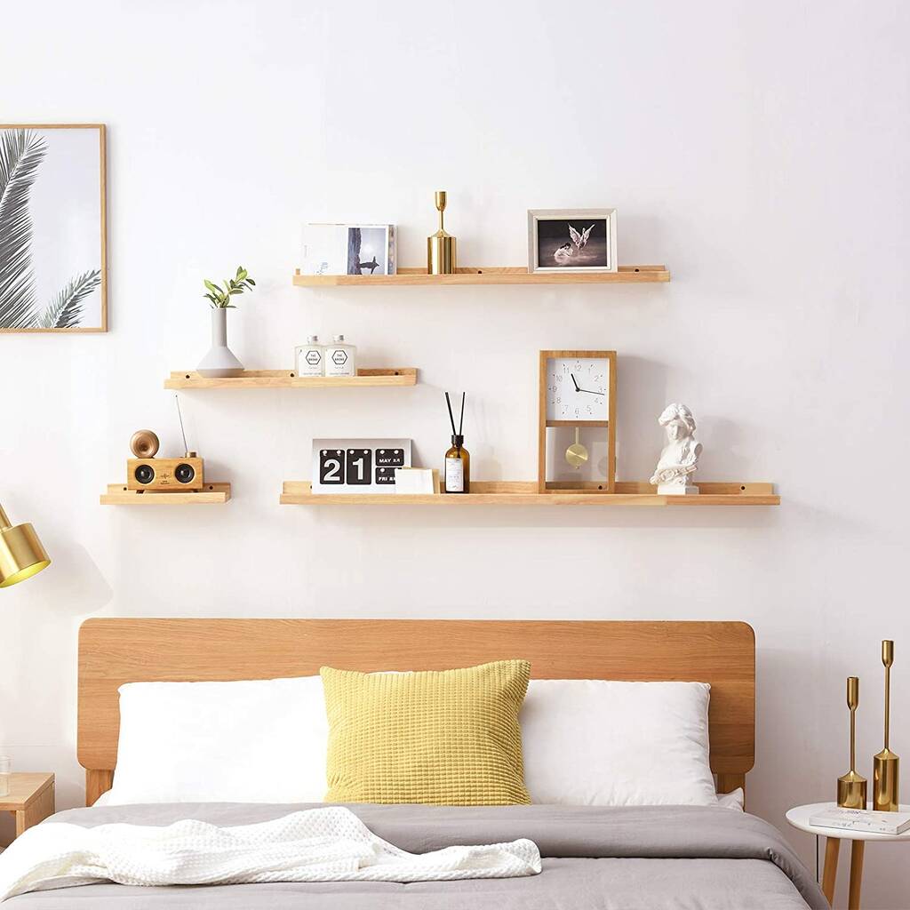 floating shelves by bed