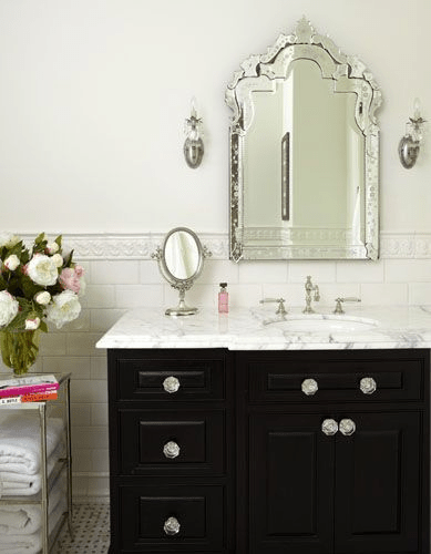 Gorgeous bathroom design with Venetian mirror