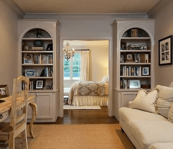 office and bedroom in one room
