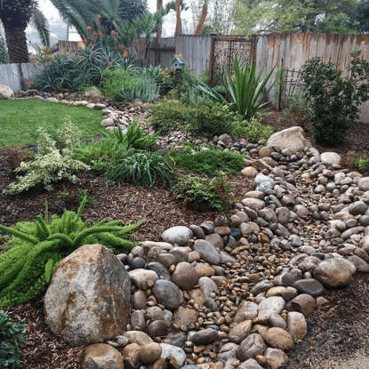 Sloped Yard Dry Creek Bed