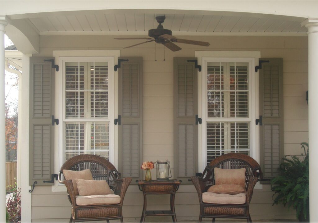 Farmhouse with Rustic brown Shutters