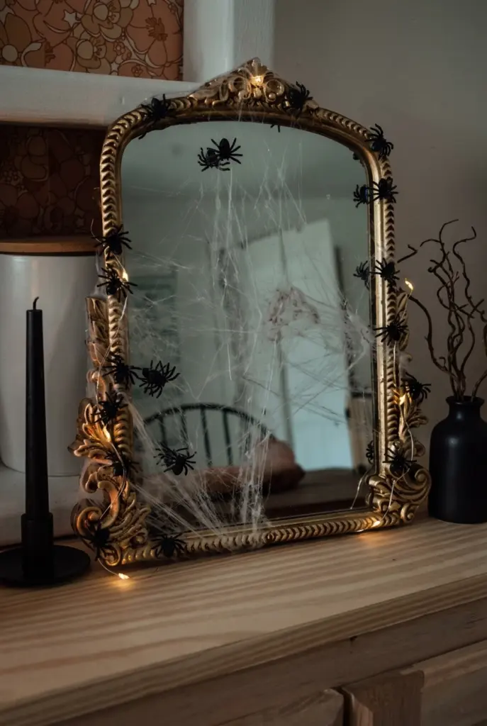 Vintage Ornate Mirror Covered in Spooky Cobwebs