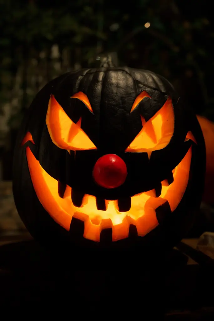 40+ Easy Pumpkin Carving Ideas for Fall & Holidays 21 Creepy Clown Pumpkin